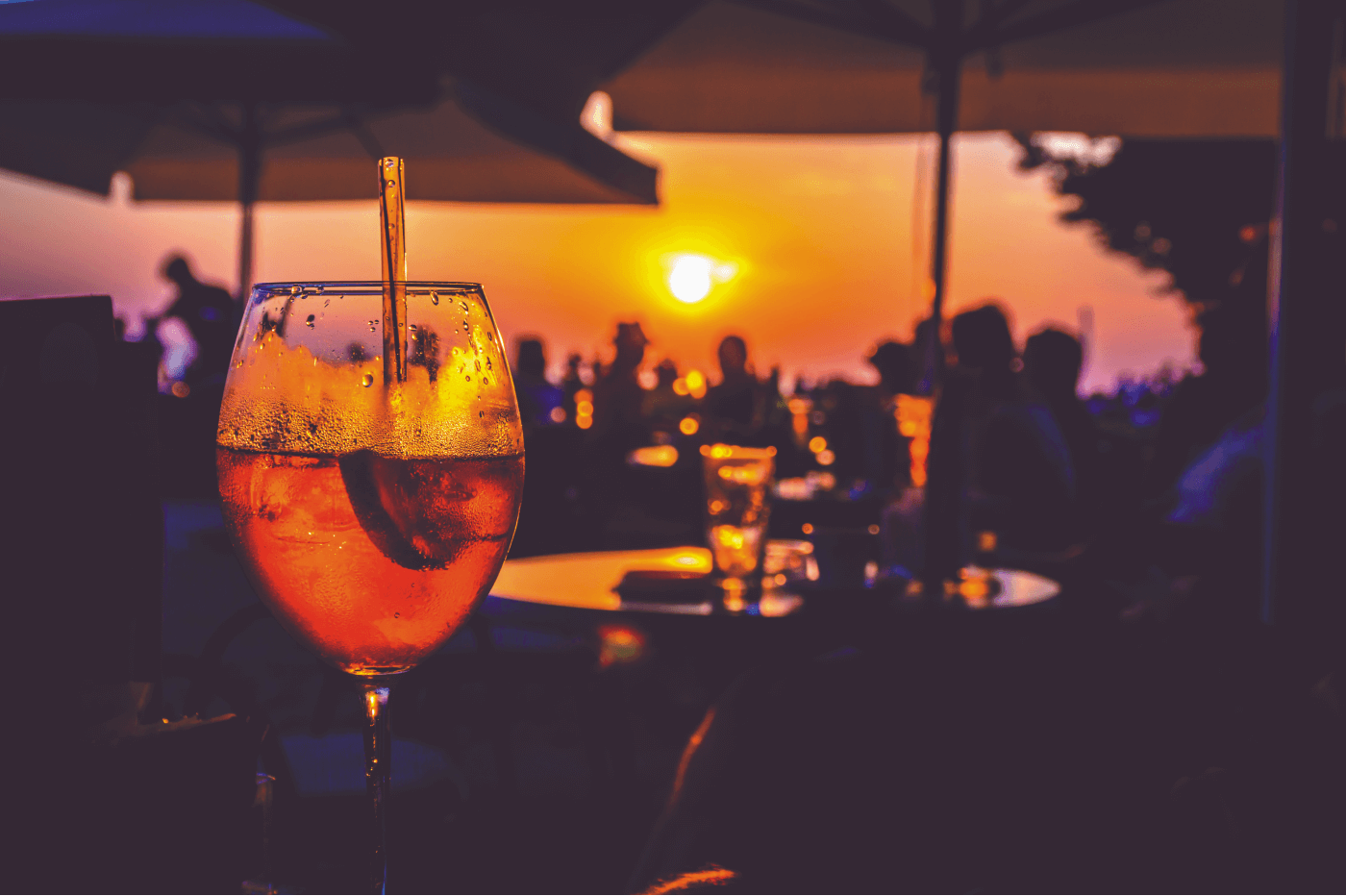 Relaxing Key West boat rentals scene at sunset with refreshing drinks, perfect for exploring the Keys. Enjoy a memorable boat adventure with stunning views and island experiences.